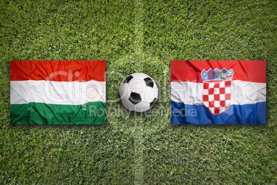Hungary vs. Croatia flags on soccer field