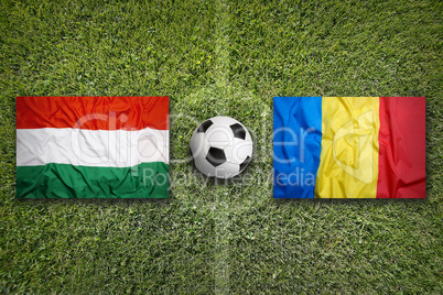 Hungary vs. Romania flags on soccer field