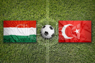 Hungary vs. Turkey flags on soccer field
