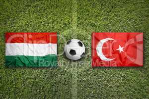 Hungary vs. Turkey flags on soccer field