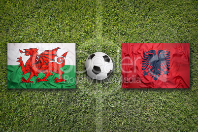 Wales vs. Albania flags on soccer field