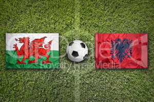 Wales vs. Albania flags on soccer field