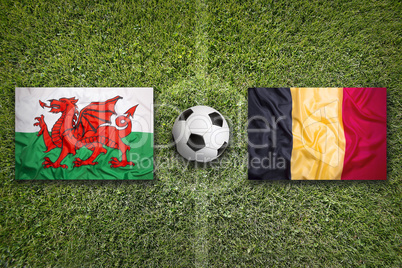 Wales vs. Belgium flags on soccer field