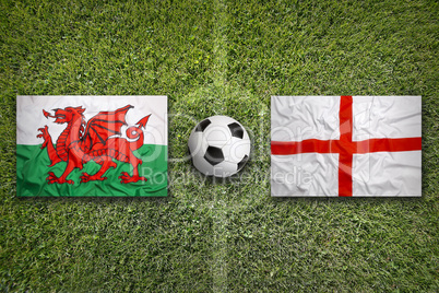 Wales vs. England flags on soccer field