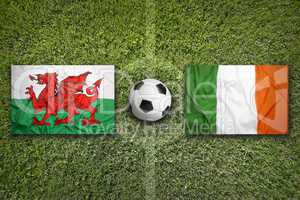 Wales vs. Ireland flags on soccer field