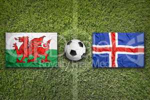 Wales vs. Iceland flags on soccer field