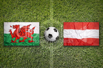 Wales vs. Austria flags on soccer field