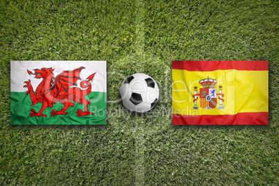 Wales vs. Spain flags on soccer field