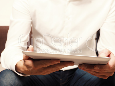 Businessman reading an ebook