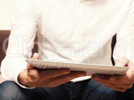 Businessman reading an ebook