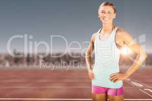 Composite image of fit woman posing and smiling