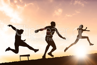 Composite image of sportsman holding a basketball