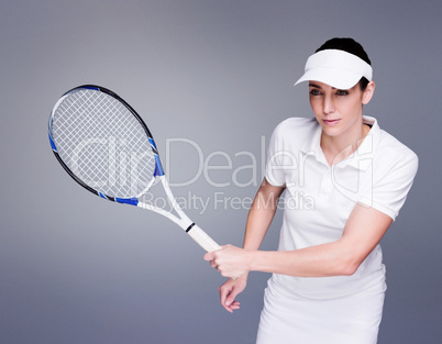 Composite image of female athlete playing tennis