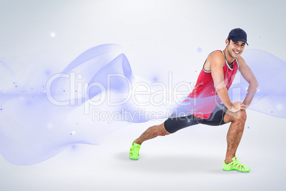 Composite image of portrait of male athlete doing stretching exe