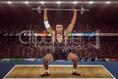 Composite image of bodybuilder lifting heavy barbell weights