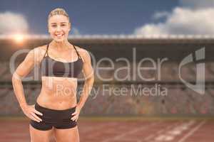 Composite image of female athlete posing with hands on hip