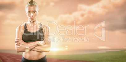 Composite image of athlete posing with arms crossed