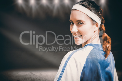 Composite image of portrait of woman soccer player