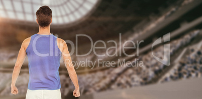 Composite image of male athlete standing on white background