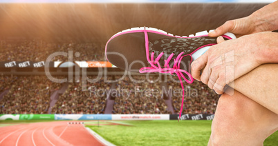 Composite image of athlete wearing trainer shoes