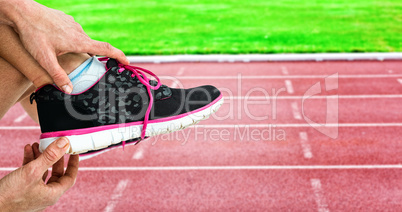 Composite image of athlete wearing trainer shoes