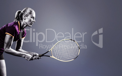 Composite image of tennis player playing tennis with a racket