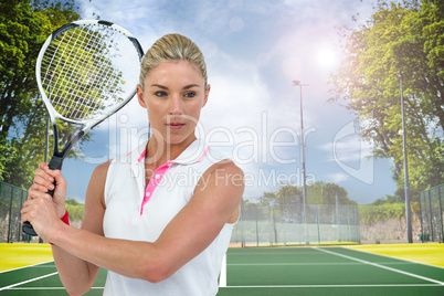 Composite image of athlete playing tennis with a racket