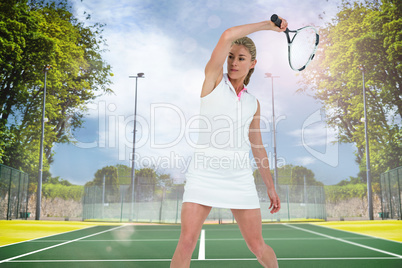 Composite image of athlete playing tennis with a racket