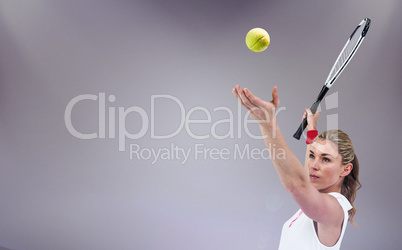 Composite image of athlete holding a tennis racquet ready to serve