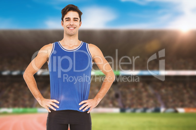 Composite image of portrait of athlete man standing with hands o