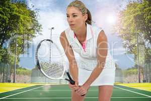 Composite image of athlete playing tennis with a racket