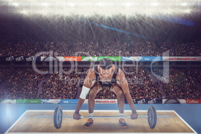 Composite image of bodybuilder lifting heavy barbell weights