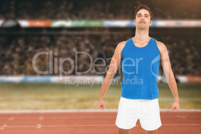 Composite image of male athlete standing on white background