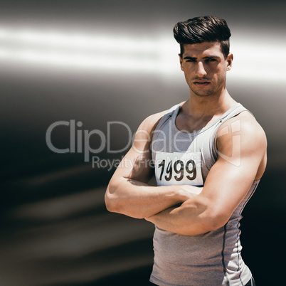 Composite image of portrait of handsome sportsman is posing with