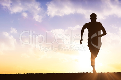 Composite image of fit man running against white background