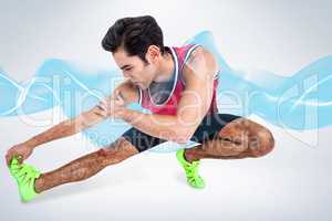 Composite image of male athlete stretching his hamstring