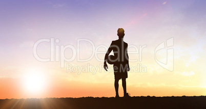 Composite image of sportsman holding a basketball