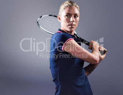 Composite image of tennis player playing tennis with a racket