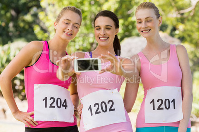 Young athlete women taking selfie