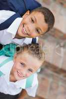 Portrait of boy and girl in school uniform