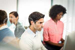 Executives working on computer