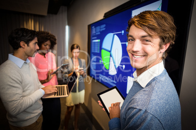 Business people standing in the conference room