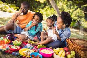 Happy family eating together