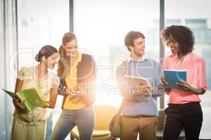 Business people holding files