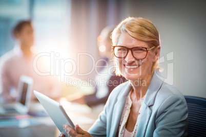 Businesswoman holding digital tablet Businesswoman holding digital tablet