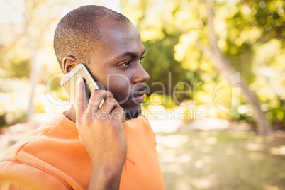 Happy man calling on the phone