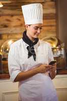 Chef using a smartphone