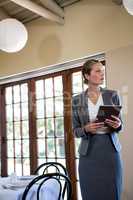 Woman holding a clipboard