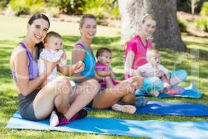 Women sitting with their babies