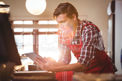 Waiter using digital tablet